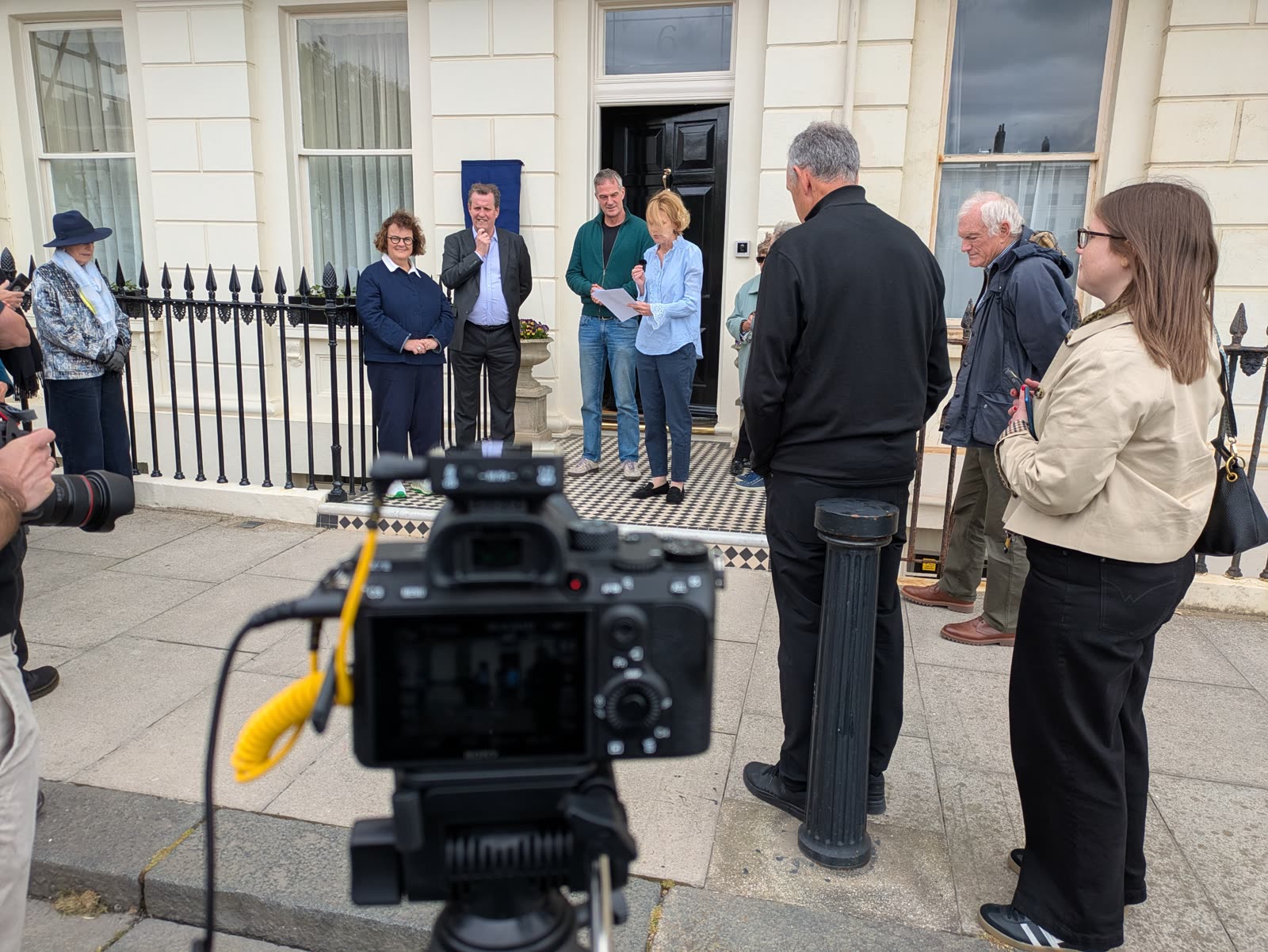 Filming the crowd at the William Sutton blue plaque unveiling in Hove