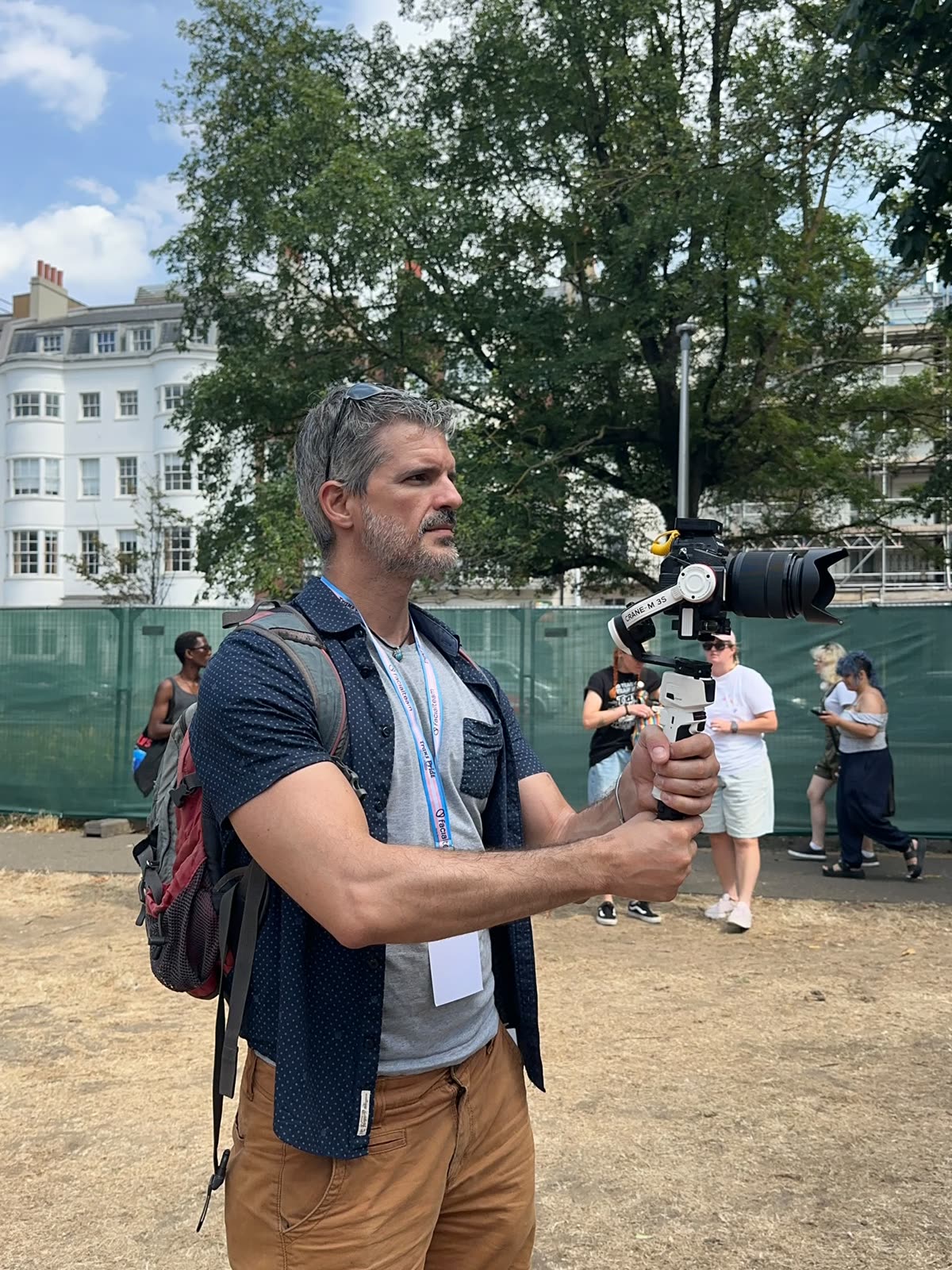 Eduardo filming with a gimbal at Trans Pride Brighton
